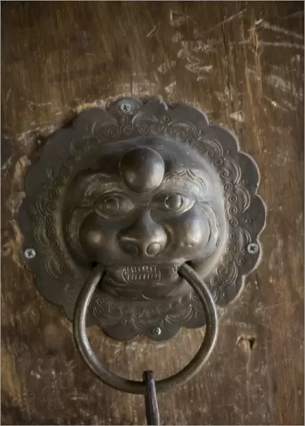 Door knocker design, Naxi -temple, Lijiang. V