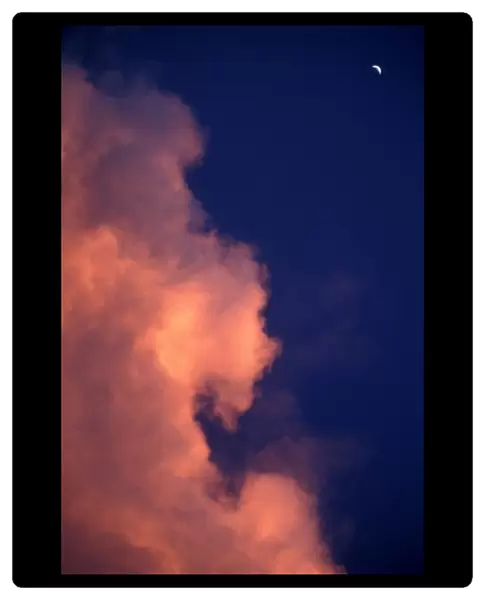 Africa, Zimbabwe, Victoria Falls National Park, Gibbous moon and clearing storm clouds