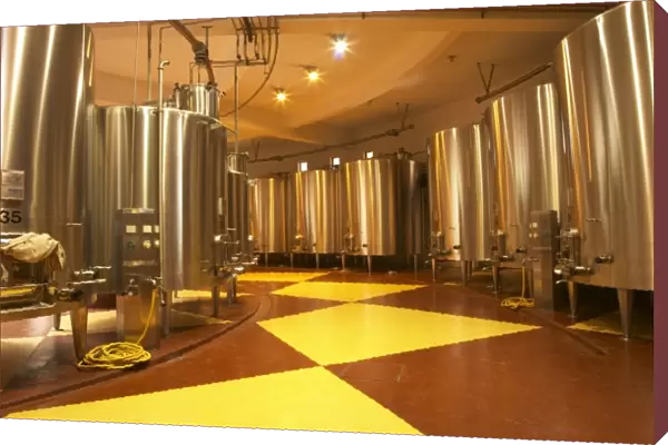 The winery, stainless steel fermentation tanks in a round building - Chateau Baron