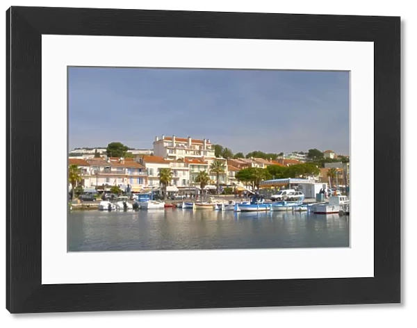 The harbour with boats and buildings along the water in Bandol Bandol Cote d Azur