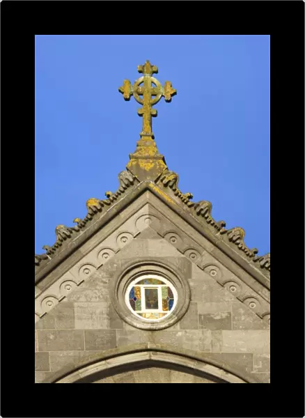 Ireland, Kilkenny. Close-up of Celtic cross on church