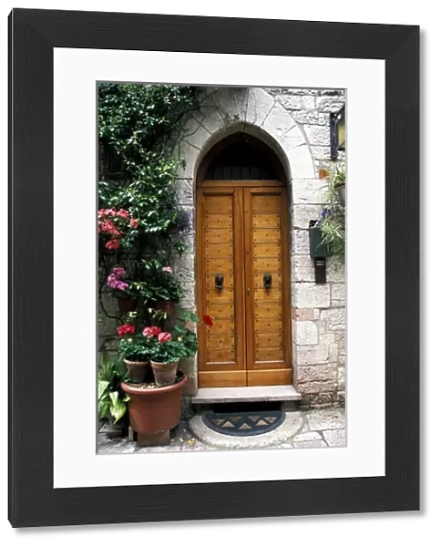 Europe, Italy, Umbria, Assisi. Medieval village door