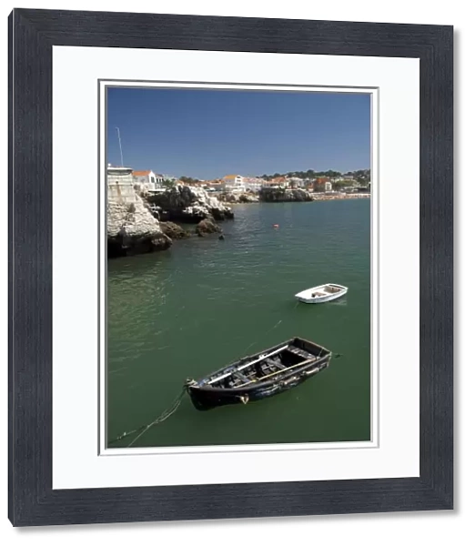 Europe, Portugal. Seaside city of Cascais, coastal view with rowboat