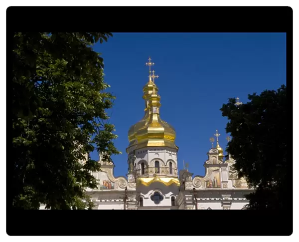 Beautiful famous Perchersk Lavra Church with gold dome in Kiev Ukraine