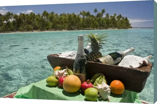 French Polynesia, Society Islands, Taha a. An assortment of fruits and champagne