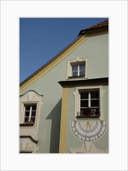 Germany, Bavaria, Passau. Historic sundial painted on wall