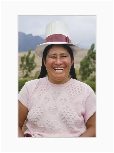 Farming portrait of woman smiling on farm in small town of Chinchero Peru South America