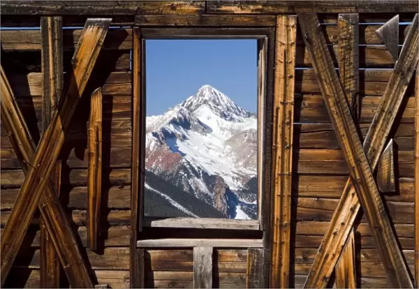 USA, Colorado, Rocky Mountains, San Juan Mountains. The window of a miners cabin