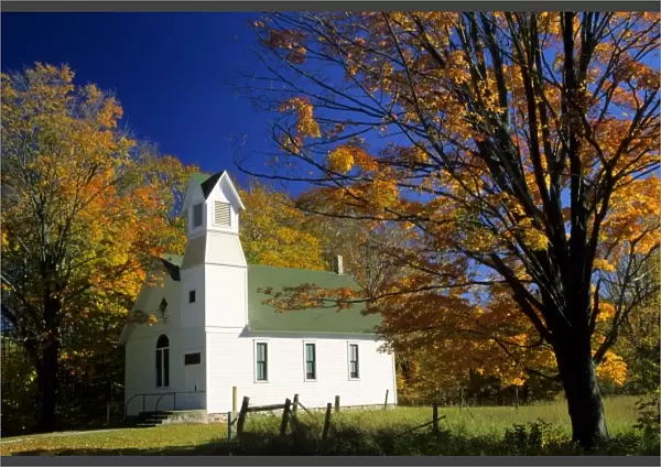 USA, Michigan, Bliss. Pioneer Memorial Church and autumn trees