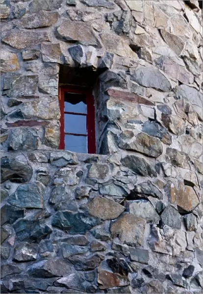 A window in the stone fire tower on Mount Prospect at at the John Wingate Weeks State Historic Site
