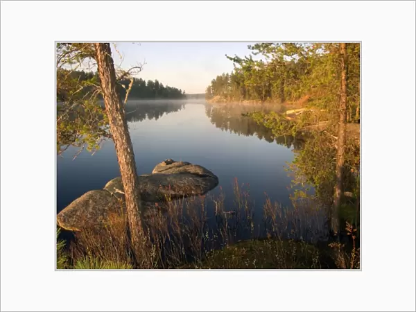 Canada, Ontario, Quetico Provincial Park, Morning Mist on Lake Kawnipi