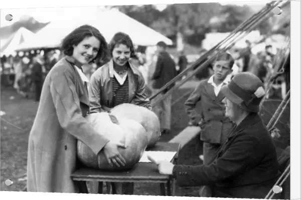 Lady with large pumpkin at Fittleworth Flower Show