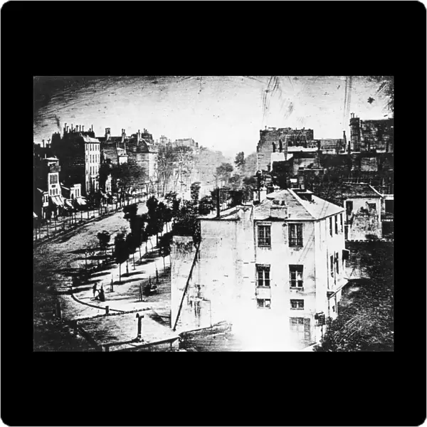 Daguerreotype made in 1838 by Louis-Jacques-Mande Daguerre of a Paris boulevard, the first photograph to show a human being