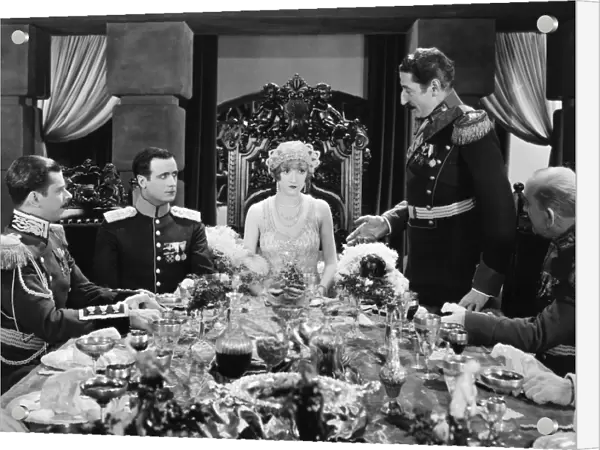 Constance Talmadge, Tullio Carminsty (at right) and Lawrence Grant (at her left) in a scene from the film