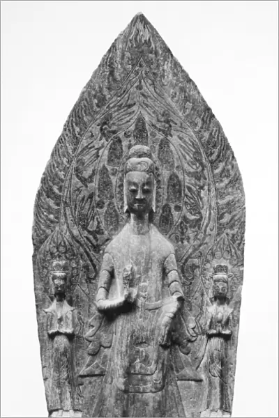 Stone stele of Buddha flanked by two Bodhisattvas. Chinese, Wei Dynasty (5th-6th century)