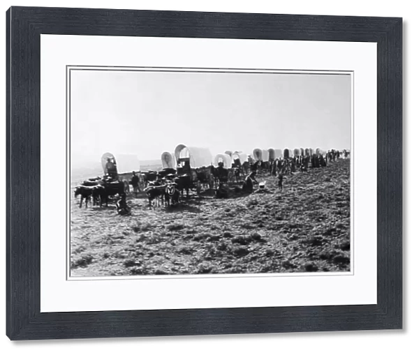 COLORADO GOLD RUSH, c1860. Covered wagons moving across the Great Plains on their