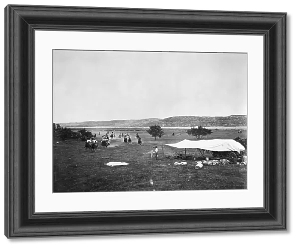 COWBOYS, c1905. Cowboys racing to dinner. Photograph, c1905