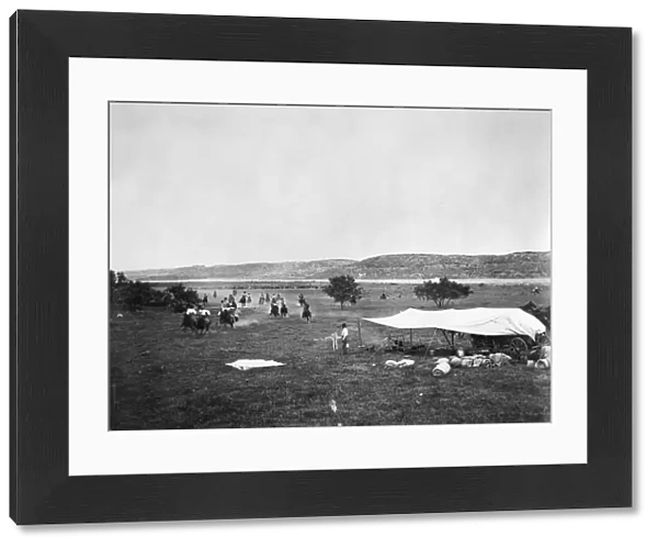 COWBOYS, c1905. Cowboys racing to dinner. Photograph, c1905