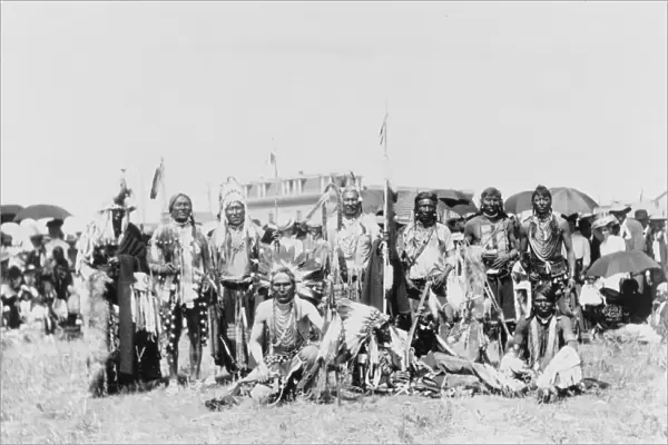 BLACKFOOT GROUP, c1907. Chief Running Wolf and a group of Blackfoot tribe members