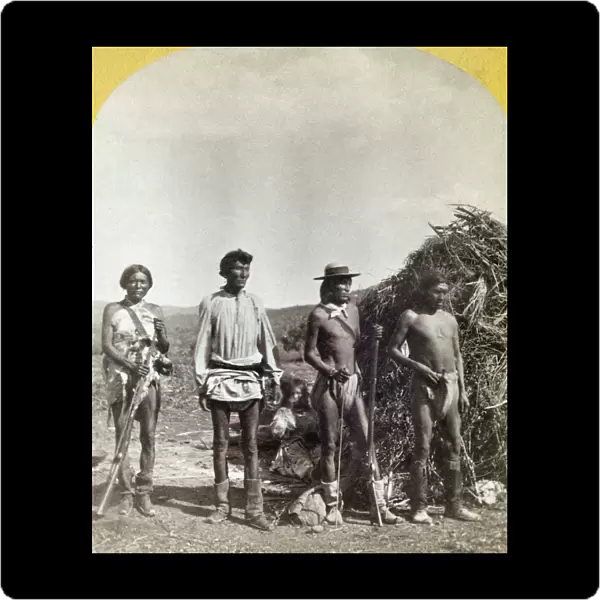 APACHE WARRIORS, c1873. Group of young Coyotero Apache warriors near Camp Apache, Arizona