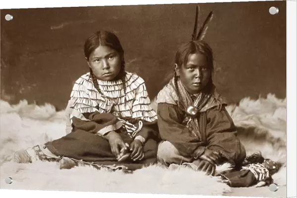 CHEYENNE CHILDREN, c1890. A Cheyenne girl and boy, with their dolls. The dolls