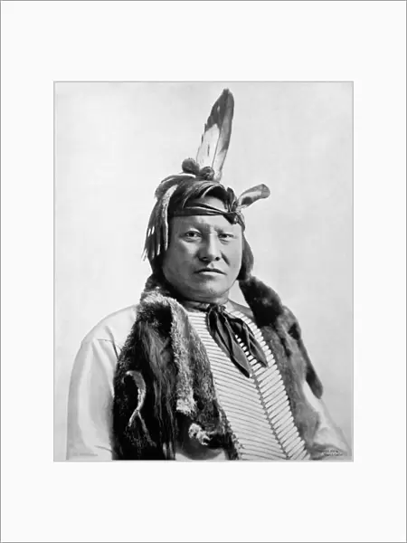 RAIN-IN-THE-FACE (c1835-1905). Lakota Sioux chief. Photograph, c1893