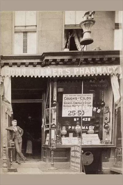 DRUGSTORE, 1890. American drugstore exterior. Photograph