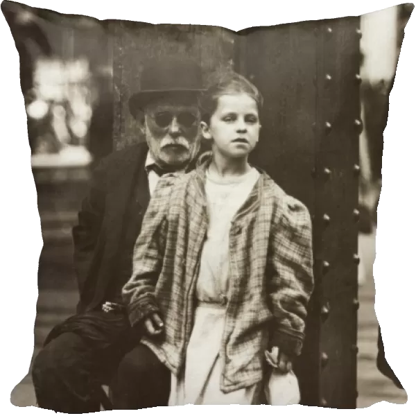 HINE: BEGGARS, 1910. An old man and young girl begging on 14th Street and 6th Avenue