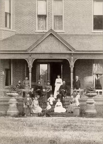 FAMILY SCENE, c1885. American family group, c1885