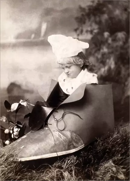 CHILD IN SHOE. Photographed c1900
