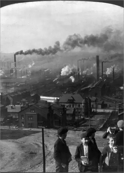 STEEL MILLS, c1907. Children playing near the steel mills at Homestead, Pennsylvania