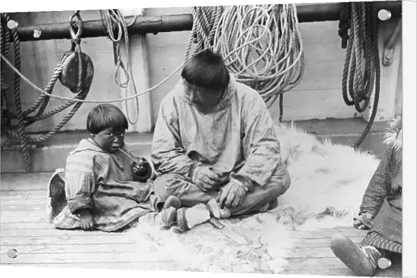 ALASKA: WHALER, 1897. Inuit aboard the deck of a whaler off the coast of Alaska