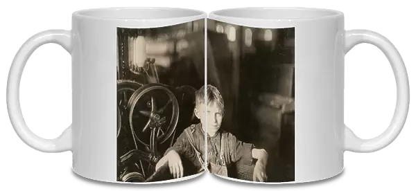 CHILD LABOR, 1909. One of the young spinners in the Quidwick Co. Mill in Anthony, Rhode Island
