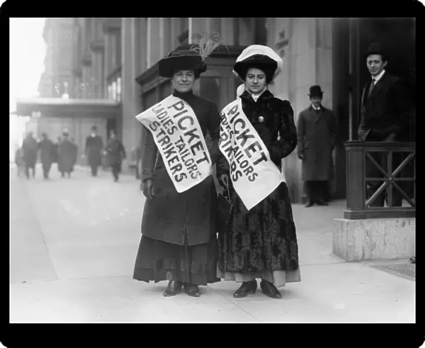 NEW YORK CITY: STRIKE, 1910. Two garment workers on a picket line during a garment