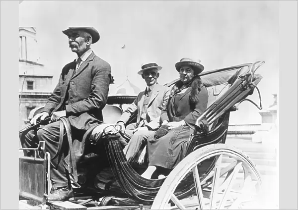 HENRY FORD (1863-1947). American automobile manufacturer, with his wife