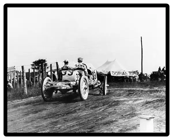 INDIANAPOLIS 500, 1911. Second-place finisher Ralph Mulford driving a Lozier during