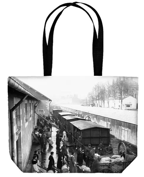 WORLD WAR I: NEVERS. French women loading boxcars with supplies for soldiers at Nevers, France