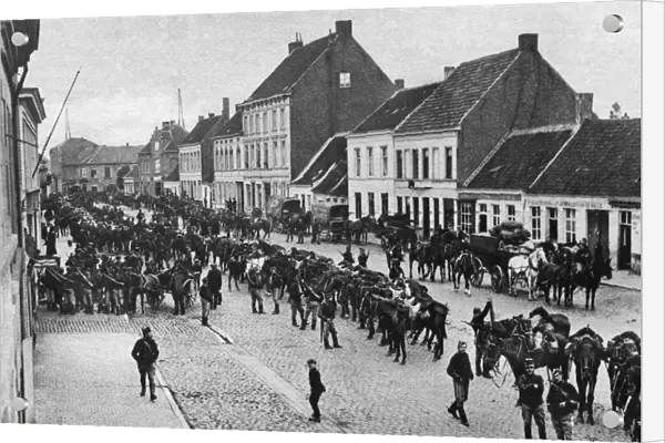 WWI: BELGIAN ARMY, c1914. Belgian chasseurs marching through Deinze, Belgium, to