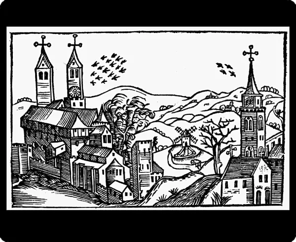 VALLEY WITH TWO CHURCHES. Woodcut from Cronycke van Hollandt, Leyden, 1517