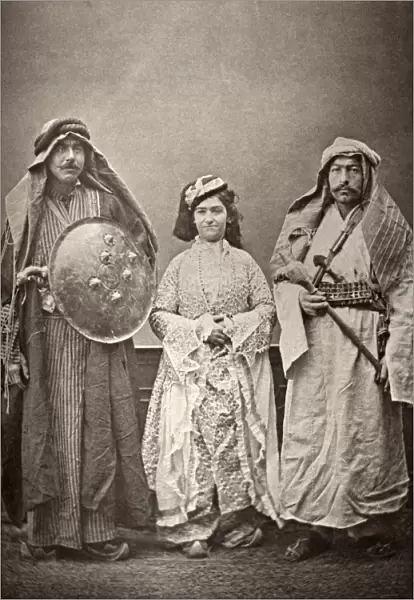 TRADITIONAL IRAQI CLOTHING. Models wearing traditional clothing from Baghdad. Left to right