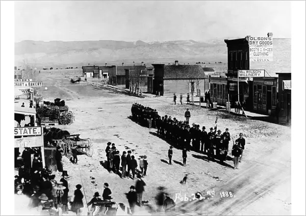 COLORADO: MONTROSE, 1888. Men in suits and military uniforms gathered for a parade