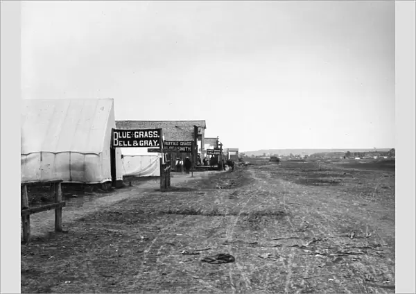 MONTANA: MILES CITY, c1880. View of a street in Miles City, Montana, showing signs