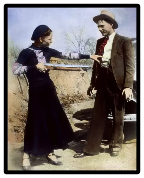BONNIE AND CLYDE, 1933. American criminal Bonnie Parker (1911-1934) playing at