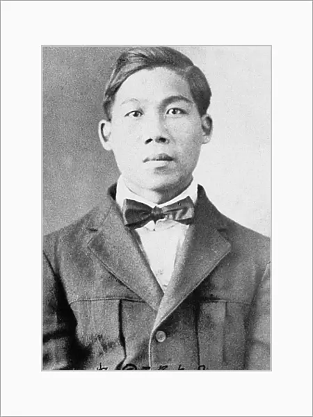 IMMIGRANTS: CHINESE, c1920. A young Chinese immigrant, photographed c1920