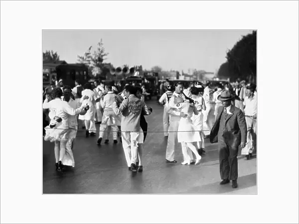 DANCE MARATHON, 1928. Couples dancing in a marathon dance contest in Culver City