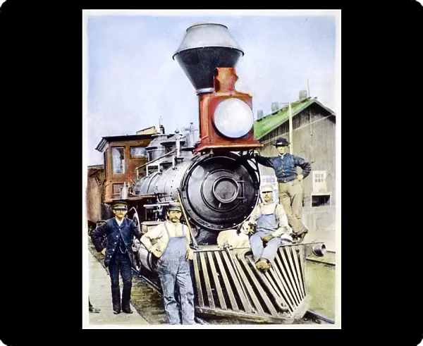 LOCOMOTIVE, 1883. The conductor, crew and canine mascot of a Central Pacific Railroad