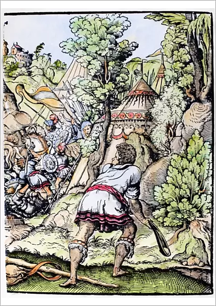DAVID AND GOLIATH. David prepares to hurl his stone at Goliath, the Philistine warrior