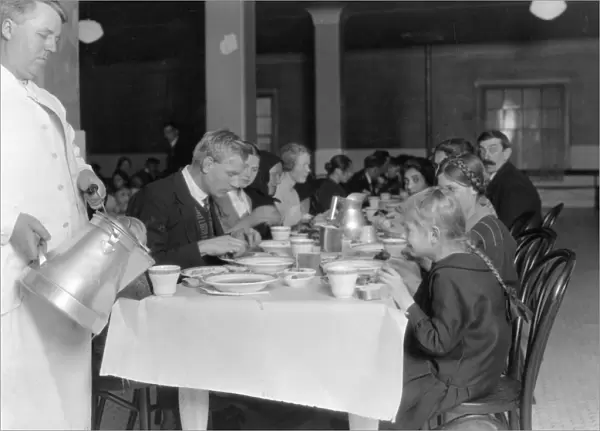 GERMAN IMMIGRANTS, 1920. German immigrants in a dining hall