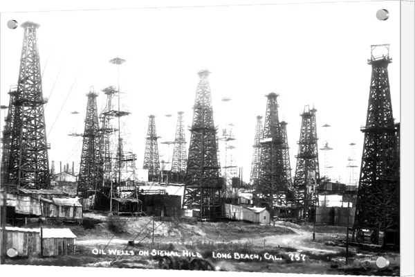 CALIFORNIA OIL WELLS, 1920s. Oil wells on Signal Hill, Long Beach, California