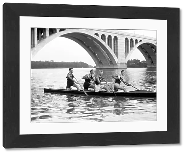 CANOE CREW, c1925. Four crew members paddling a canoe at the Potomac Boat Club